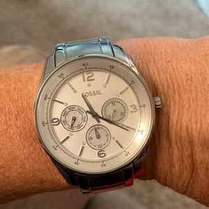 Fossil watch, larger face. Shiny and matte silver in color